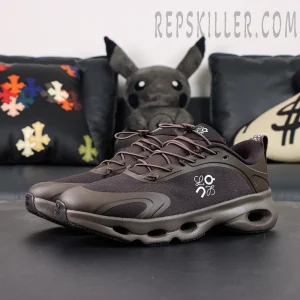 Loewe x ON Cloudsolo Dark Brown Black sneakers, front-side view with sofa background