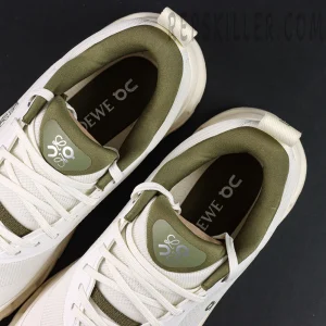 Interior and tongue detail of Loewe x ON Cloudtilt 2 White Khaki featuring olive lining and co-branded logo