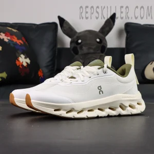 Angled view of Loewe x ON Cloudtilt 2 White Khaki showcasing lightweight cushioning and streamlined silhouette