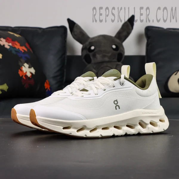 Angled view of Loewe x ON Cloudtilt 2 White Khaki showcasing lightweight cushioning and streamlined silhouette