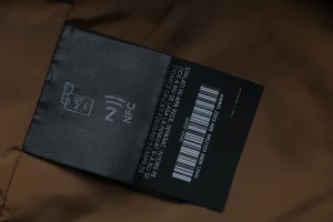 Miu Miu Single-Breasted Glossy Trench Coat Wash label