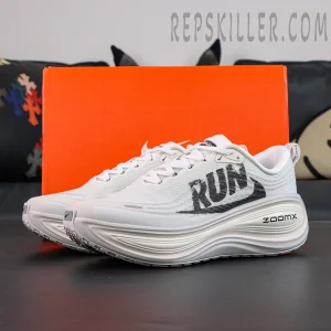 Nike Vomero Plus Run Pack running shoes displayed with original shoe box