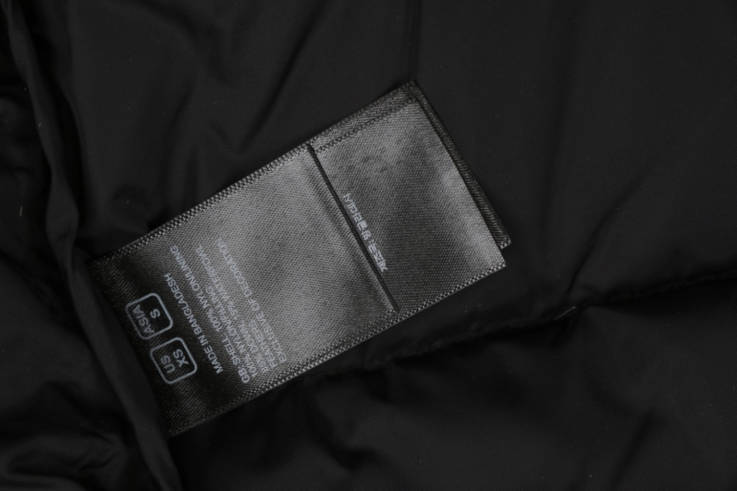 The North Face 1996 Retro Nuptse Down Jacket Wash label