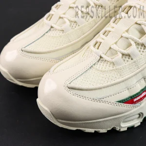 Close-up of the toe box on Undefeated x Nike Air Max 95 “Sail”, showing smooth leather and mesh texture