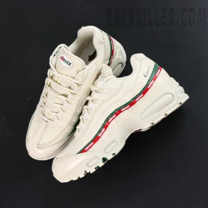 Top-down angled view of Undefeated x Nike Air Max 95 “Sail”, highlighting layered upper design