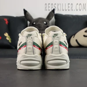 Full pair display of Undefeated x Nike Air Max 95 “Sail” with original shoebox