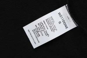 We11done Three-Eye Deer Graphic Zip-Up Hoodie Wash label
