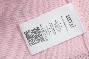 Ami Embossed Heart Knit Cardigan Wash label