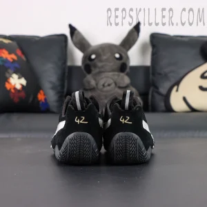 Balenciaga x Speedcat Suede Black White sneakers, straight rear view with both heels aligned