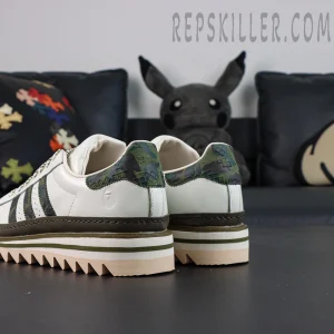 CLOT x BAPE x adidas Superstar “Off White Olive Cargo” sneakers, rear view highlighting camouflage heel panels and layered midsole