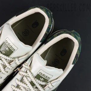 CLOT x BAPE x adidas Superstar “Off White Olive Cargo” sneakers, inner view showing insole graphics and collaboration branding