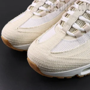 Levi’s x Nike Air Max 95 OG “Light Orewood Brown” toe box close-up showing denim texture and detailed stitching