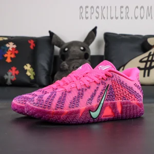 Nike Ja 3 “Price of Admission” basketball shoes, side profile with bright pink upper and mint green Swoosh