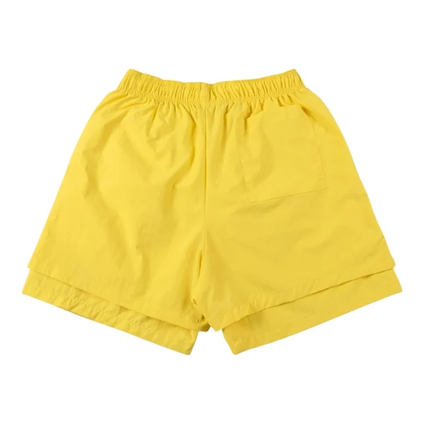 Sp5der Sunburst Yellow Logo Graphic Shorts Back view