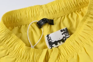 Sp5der Sunburst Yellow Logo Graphic Shorts8