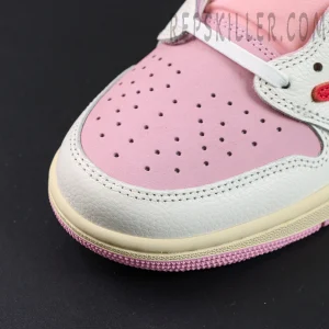 Travis Scott x Jordan 1 Low OG “Tropical Pink”, toe box close-up with pink perforated leather and white overlays
