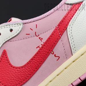 Travis Scott x Jordan 1 Low OG “Tropical Pink”, side mid-panel close-up with reverse Swoosh and pink gradient upper