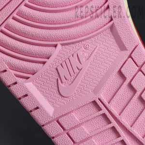 Travis Scott x Jordan 1 Low OG “Tropical Pink”, outsole close-up with pink rubber traction pattern and Nike logo
