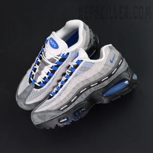 Undefeated x Nike Air Max 95 “Concord” sneakers, top-down view showing grey suede upper and blue accents