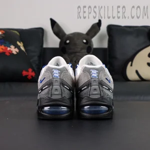 Undefeated x Nike Air Max 95 “Concord” sneakers, straight rear view showing Air Max unit and UNDEFEATED details