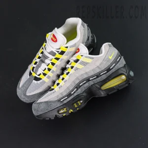 Undefeated x Nike Air Max 95 “Yellow” sneakers, top-down view showing overall upper and UNDEFEATED side tape