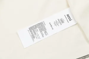 Ami Logo Embroidered Contrast Stitch T-Shirt Wash label
