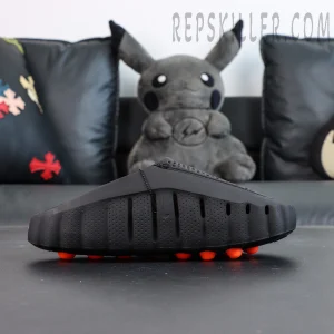 Nike Mind 001 “Black” clogs lateral view with streamlined silhouette and minimal design