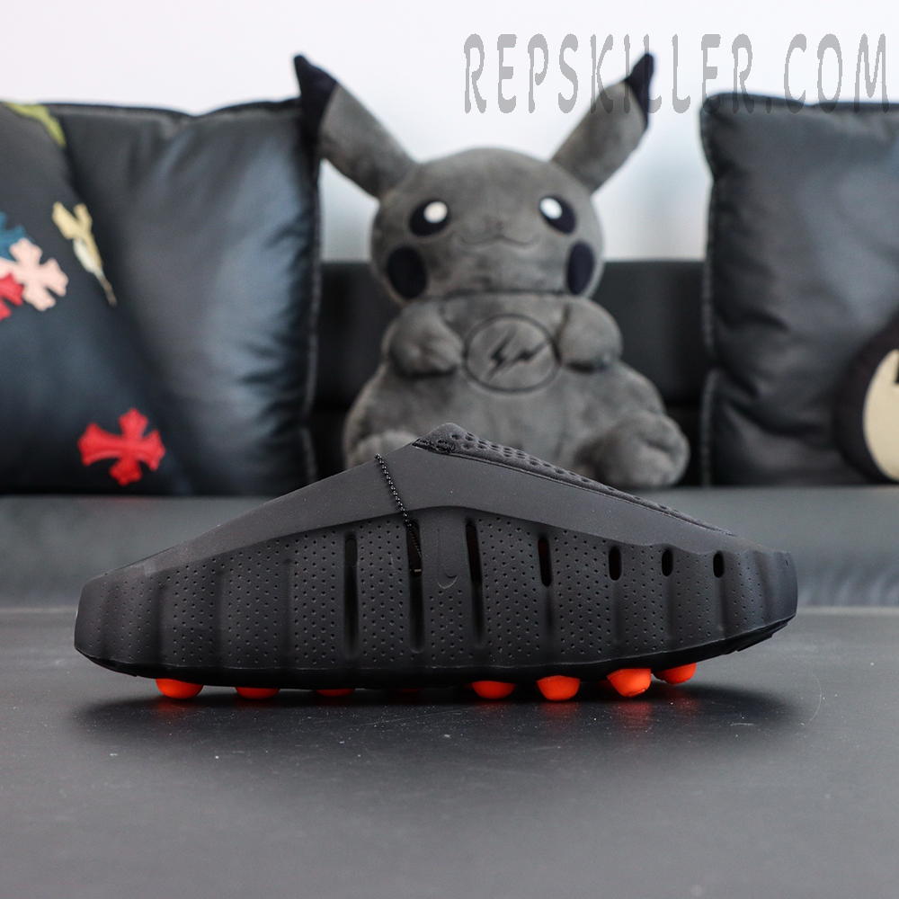 Nike Mind 001 “Black” clogs lateral view with streamlined silhouette and minimal design