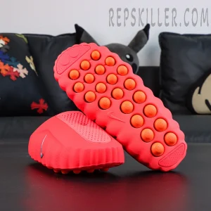 Nike Mind 001 Mule “Solar Red” outsole view with multiple orange cushioning pods