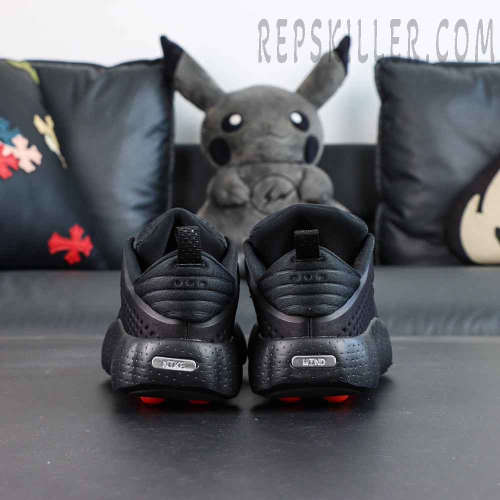 Nike Mind 002 “Black Hyper Crimson” rear view with sculpted heel and branding detail