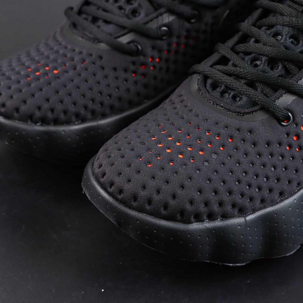 Nike Mind 002 “Black Hyper Crimson” toe detail with perforations and red inner accents