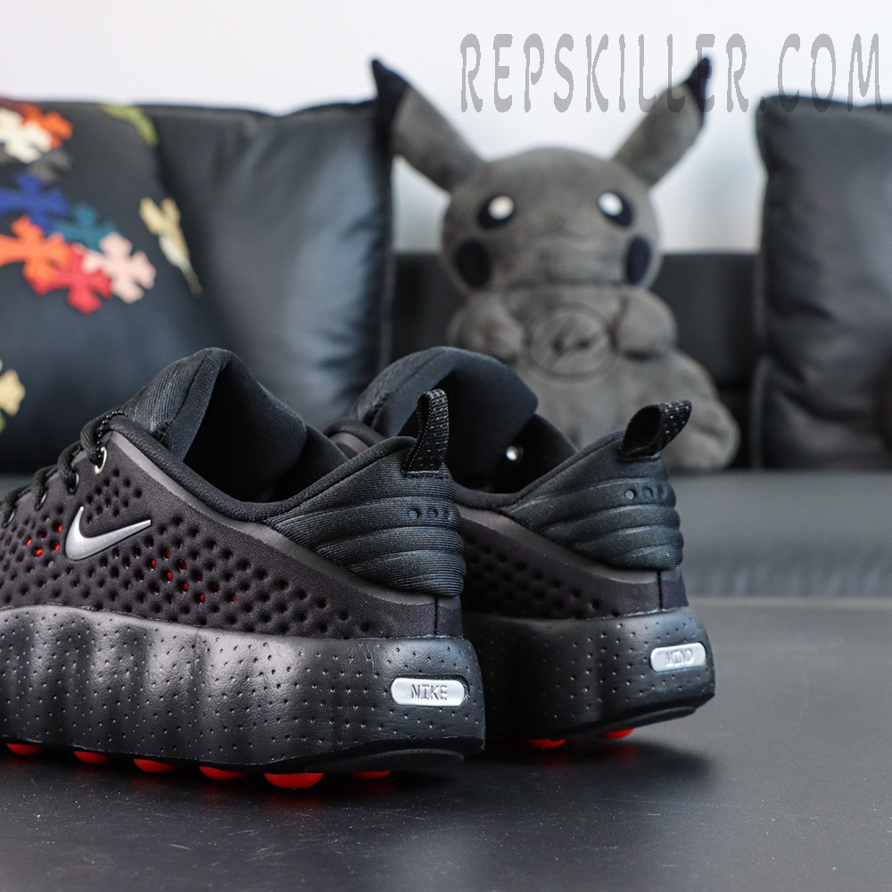 Nike Mind 002 “Black Hyper Crimson” rear-side detail with heel tag and textured midsole