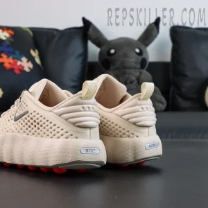 Nike Mind 002 “Light Khaki” rear view with minimal heel design and branding