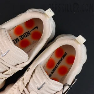 Nike Mind 002 “Light Khaki” insole detail with orange pods and branding