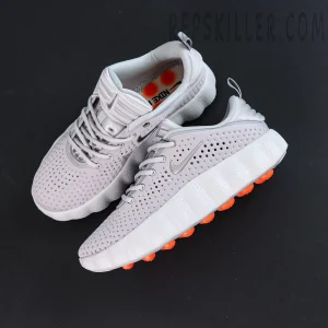 Nike Mind 002 “Light Smoke Grey” top view with minimalist design and perforated upper