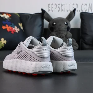 Nike Mind 002 “Light Smoke Grey” rear view with sculpted heel and branding detail