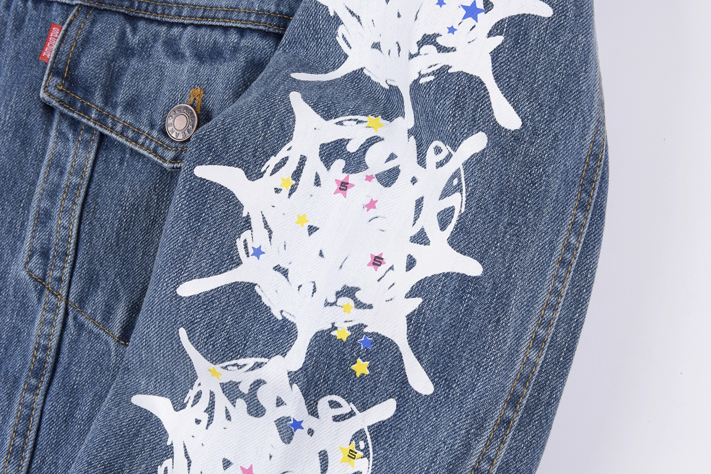 Sp5der Washed Blue Graphic Sleeve Denim Jacket10