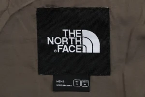The North Face Dual Pocket Hooded Windbreaker Jacket Brown Brand label