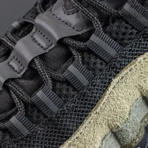 Undefeated x Nike Air Max 95 “Medium Olive” sneakers, upper material close-up showing mesh and suede textures