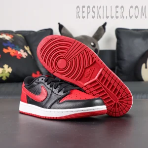 Air Jordan 1 Low outsole view with red rubber sole and classic traction pattern