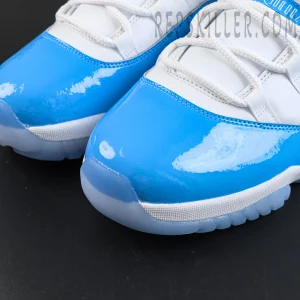 Air Jordan 11 Low toe box close-up with glossy patent leather and stitching