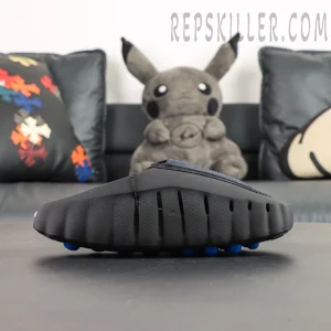 Fragment x Nike Mind 001 Black side profile with minimalist slip-on build and sculpted midsole