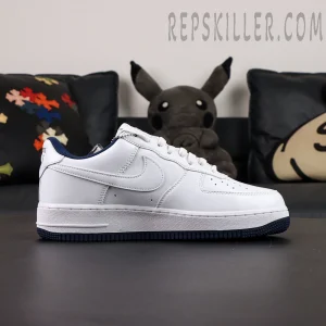 Air Force 1 side profile with clean white leather and fine stitching details