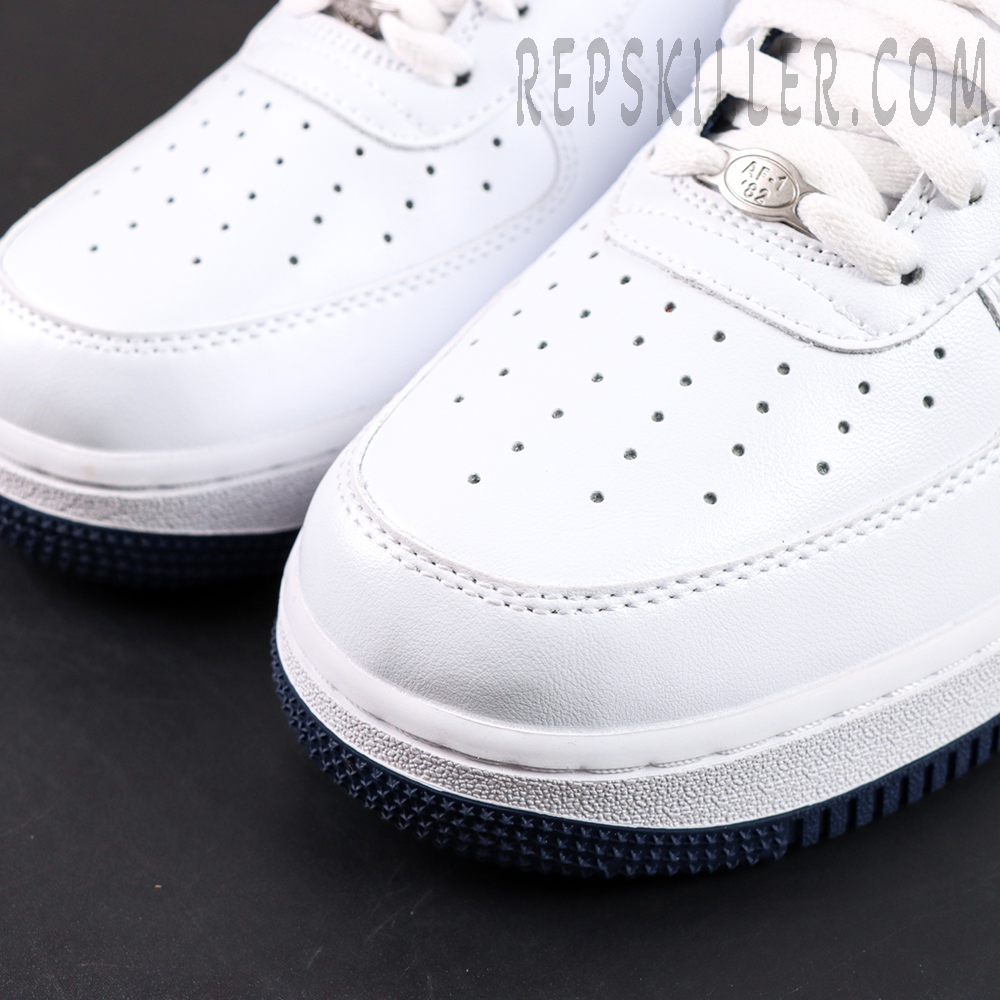Air Force 1 toe box detail with perforations and AF1 lace dubrae