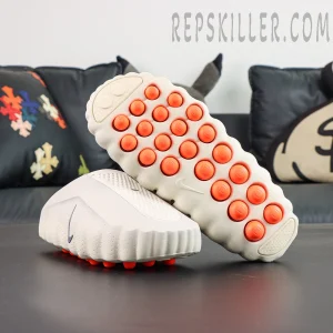 Nike Mind 001 outsole view with multiple orange cushioning pods layout