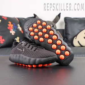 Nike Mind 002 outsole view with orange cushioning pods