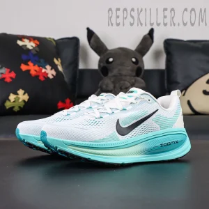 Nike Vomero 18 GS side angle with streamlined midsole and ZoomX cushioning