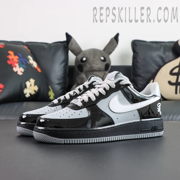 Side view with glossy black overlays and white Swoosh