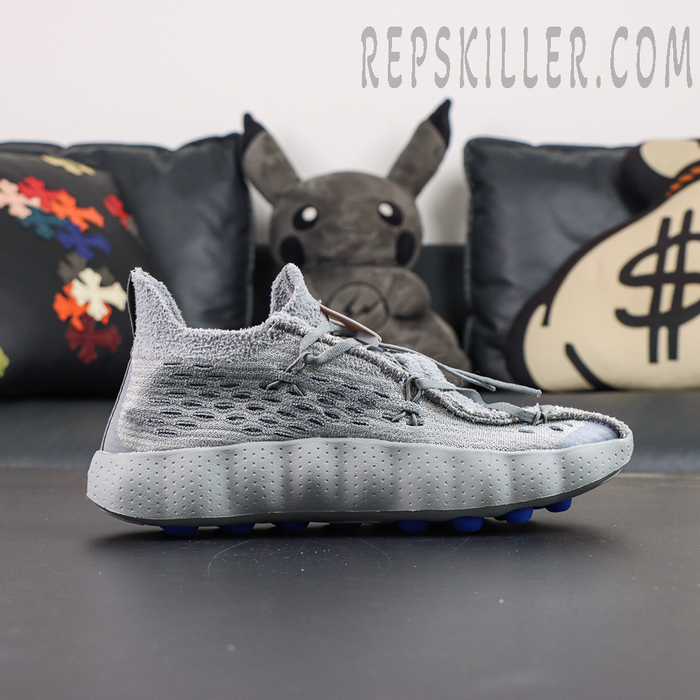 Fragment Design x Nike Mind 002 Flyknit “Particle Grey” lateral side view featuring lightweight grey upper and cushioned midsole