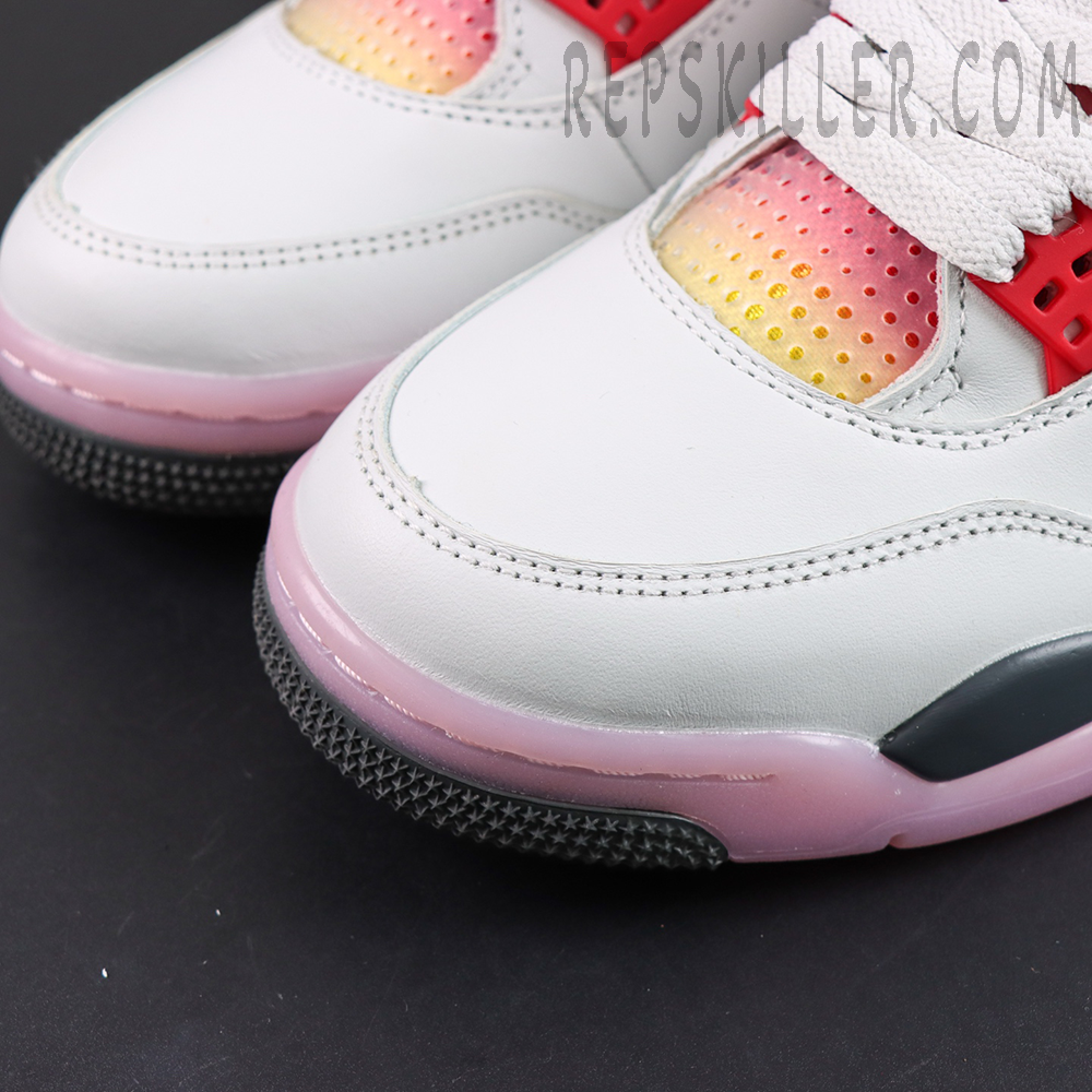 Jordan 4 Retro “Comic” toe detail featuring smooth white leather contrasted by pink and yellow gradient mesh panels